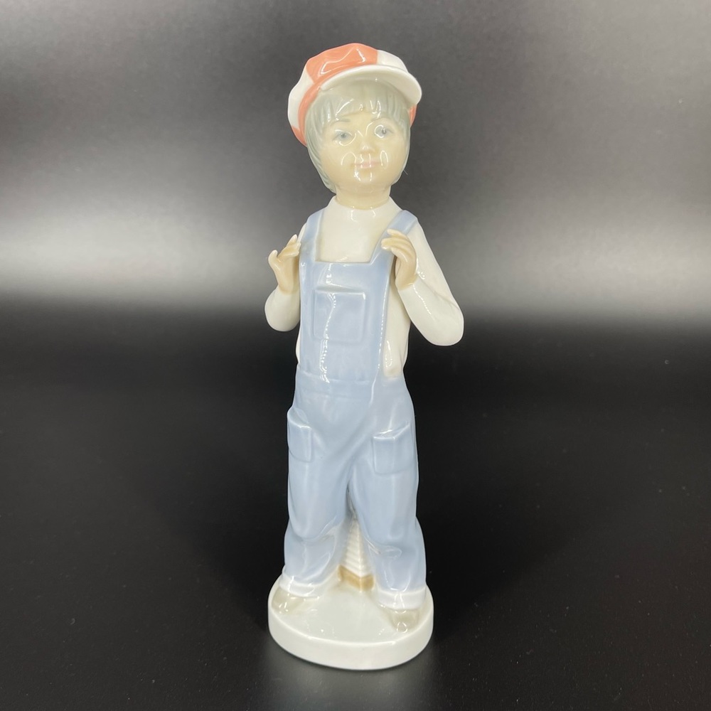 Lladro Boy in Blue Overalls Sculpture